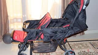 Safety twin stroller