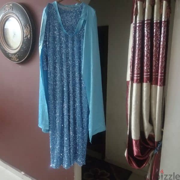 فستان سوارية يعتبر كالجديد لون ازرق سماوي ممتااااااز 1