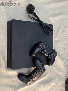 PS4 Slim 1tb (lightly used) 2 controllers in good condition with box.
