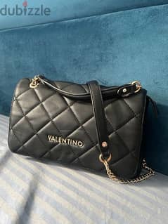 VALENTINO PRICE:15,000 EGP Denoting both style and affordability