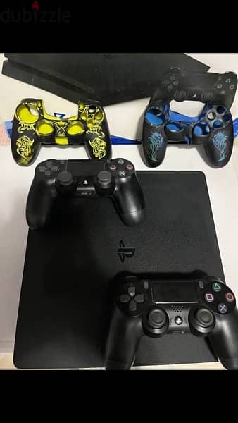 ps4 + 2 controllers + 3 games + 2 stands 4