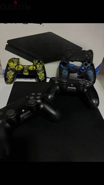 ps4 + 2 controllers + 3 games + 2 stands 5