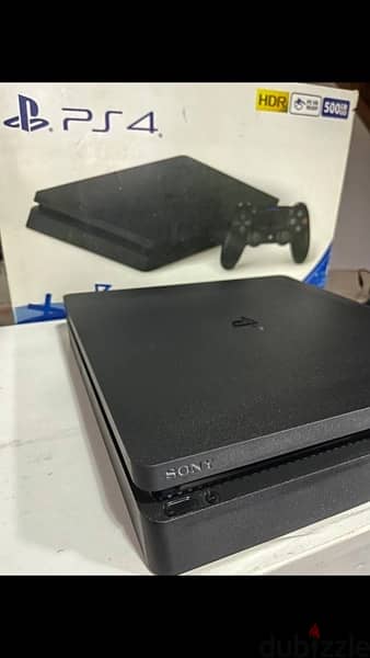 ps4 + 2 controllers + 3 games + 2 stands 9