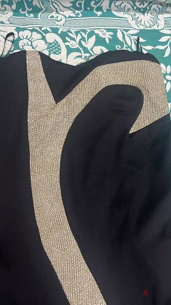 فستان اسود و فستان تاني اسود في دهبي اي قطعة ب ١٠٠٠ج 0