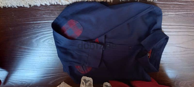 Used once Red tag men dark blue shirt / size xxl 6