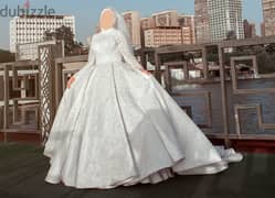 فستان زفاف جميل مطرز هاند ميد تصميم العقاد موضه 2024