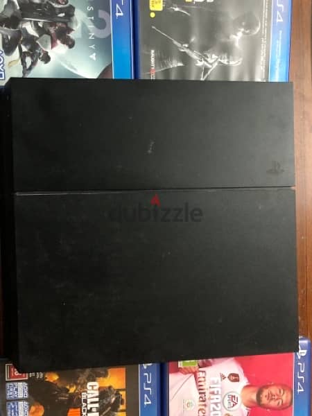PS4 Fat 1 TB Used + Cables + 2 controllers + 6 games 0