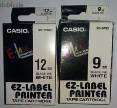 2علبة شريط ملصقات الطابعات يابانى من كاسيو 12mm و9mm ابيص واسود للبيع 0