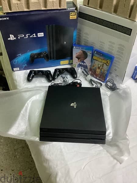 Brand NEW PS4 Pro 1 TB & 2 original controllers and all accessories 1