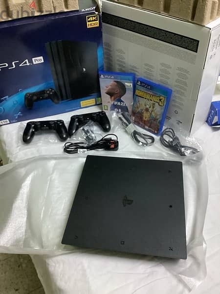 Brand NEW PS4 Pro 1 TB & 2 original controllers and all accessories 3