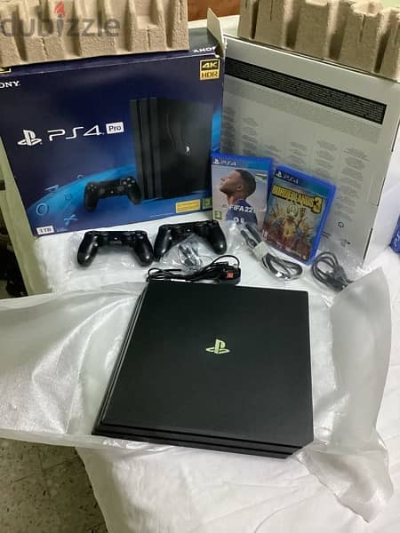 Brand NEW PS4 Pro 1 TB & 2 original controllers and all accessories 4