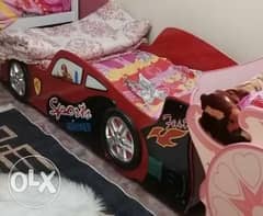 سرير اطفال على شكل سيارة برق بنزين مستعمل للبيع 0
