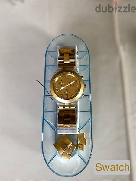 Swatch gold watch ساعه سواتش ذهبي 1