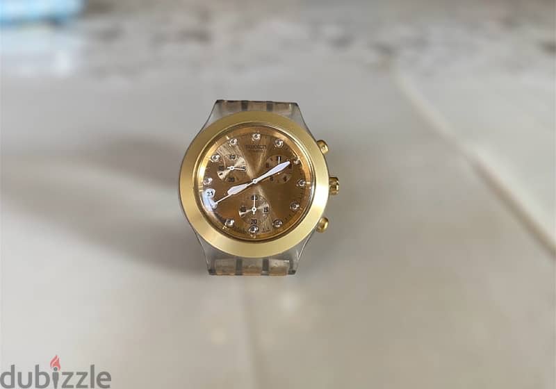 Swatch gold watch ساعه سواتش ذهبي 3