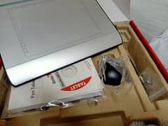 graphic tablet with pin and mouse