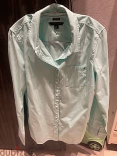قميص تومي مقاس ميديام استخدام مره واحده اللون اخضر فاتح اوريجنال 0