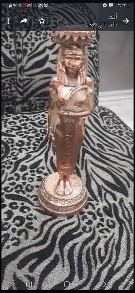 شمعدان من النحاس الاحمر الاصلي الامعRed copper statue