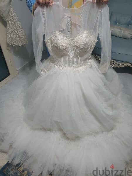 فستان زفاف من ماركة لافي استعمال ٤ ساعات فقط 3