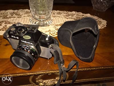 عشاق الكاميرات القديمه yashica يابانى اصلى. مع فلاش