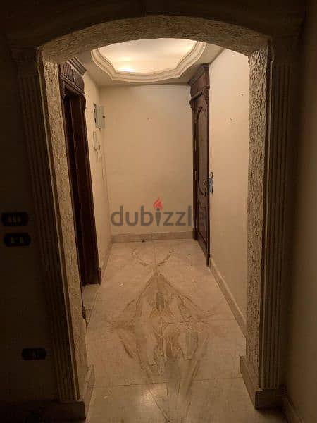 Partially furnished apartment in Maadi Grand City compound 1