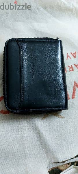 محفظه باليرى وارد الخارج به ١٢ جيب ٢ سوسته 3