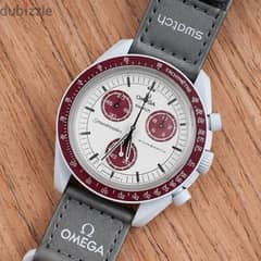 Brand new original Omega swatch mission to Pluto from UAE 0