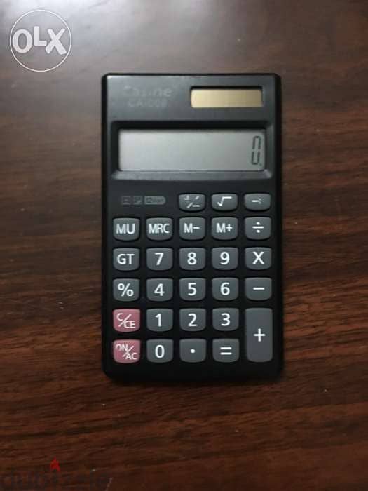 citizen - casine -dinky mini calculator 3