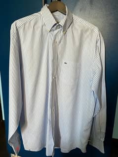 blue and white Lacoste shirt size 46