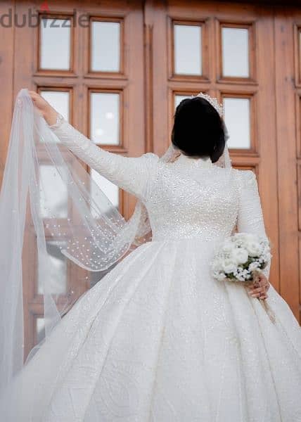 فستان زفاف جديد بالطرحة للايجار 1