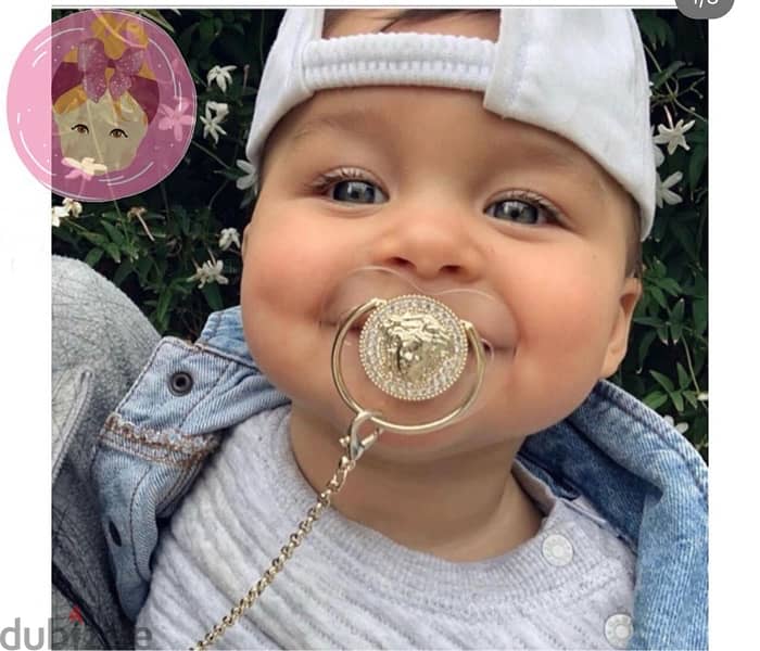 pacifier for baby . . Gucci . . Versace . . lX available brand 0