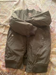 Dark green jacket as new for girls