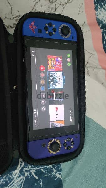 Nintendo switch with case نيتيندو سويتش 0