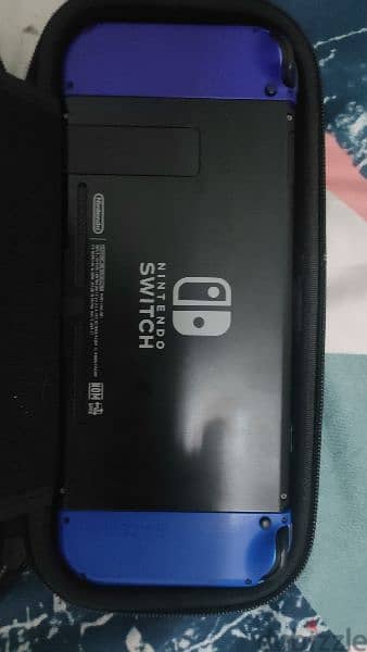 Nintendo switch with case نيتيندو سويتش 1