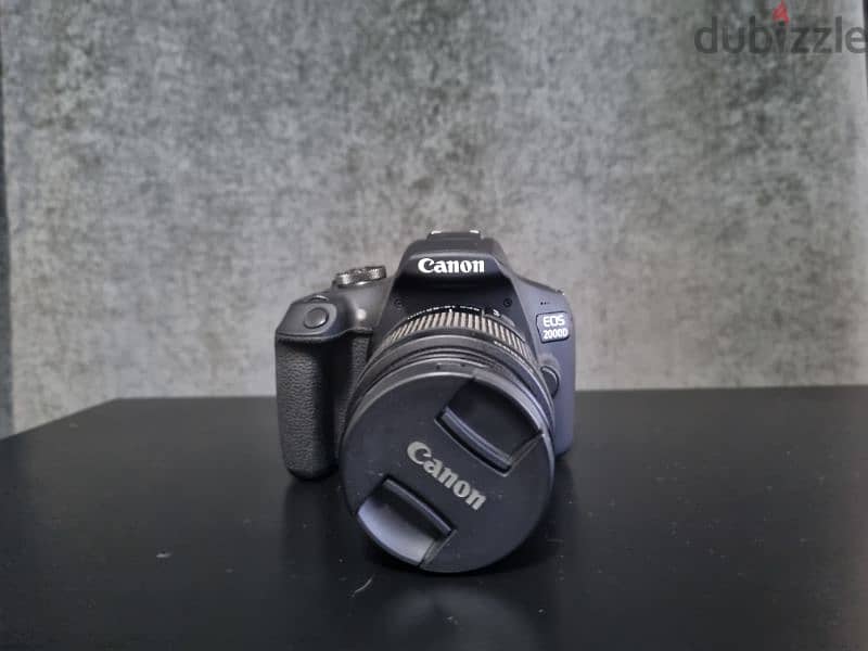 Camera Canon D2000 zoom 18-55, used 2 times only as brand new. 2