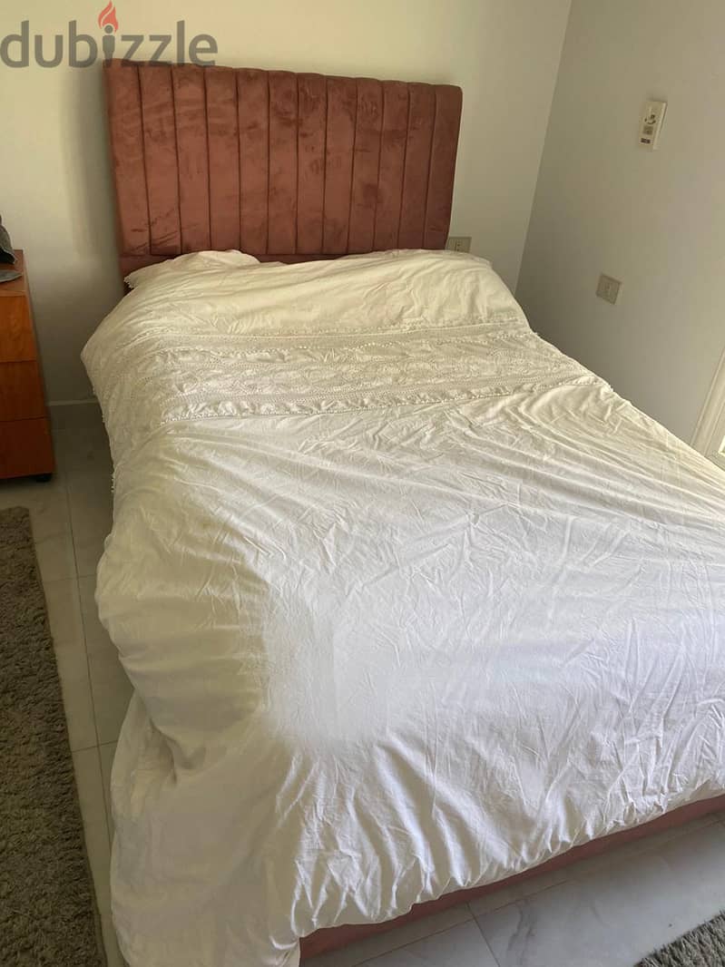 Single pink bed with matress 1