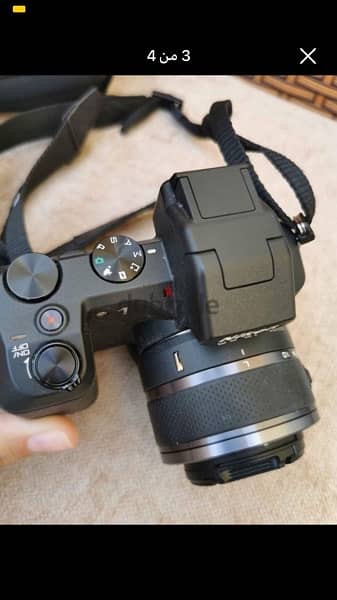 Nikon camera, model 1v2, UK rose, with holder + charger + bag 2