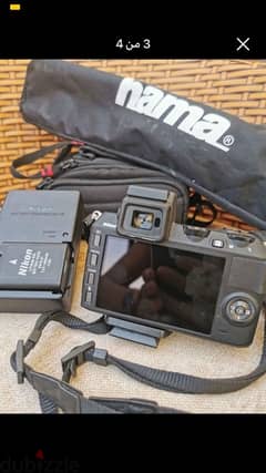 Nikon camera, model 1v2, UK rose, with holder + charger + bag