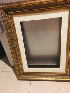 A classical rectangle frame with golden borders 0