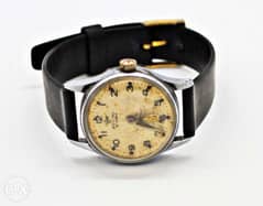 ساعة قديمة أرقام عربية وحزام جلد أسود 0