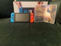 Nintendo switch with carry case and legend of zelda game 0