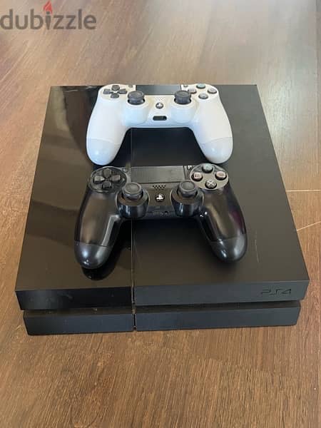 PS4 Fat 1TB two original controller for great condition 0