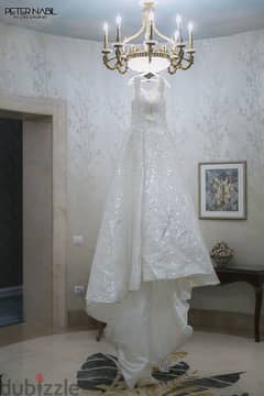 wedding dress from Paris with long tail used once like new