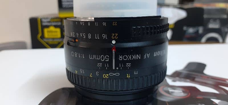 Nikon lens 50mm D لينس نيكون 50ملي مانيول 1