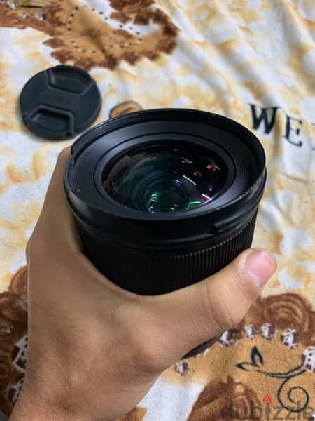 lens sigma 24/35 for canon f 2 4