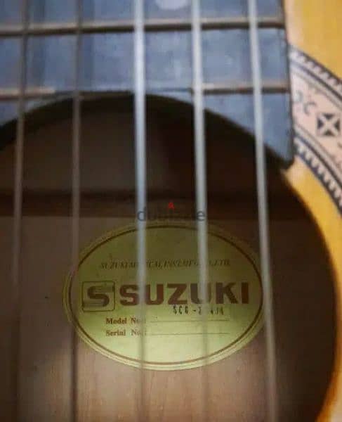 guitar suzuki  ياباني بالشنطه 1