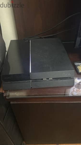 ps4 fat with 2 controllers and a camera v2 1