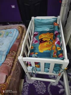 سرير اطفال هزاز خشب زان 0