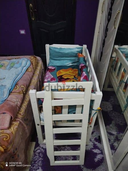 سرير اطفال هزاز خشب زان 1