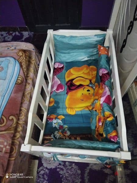 سرير اطفال هزاز خشب زان 3