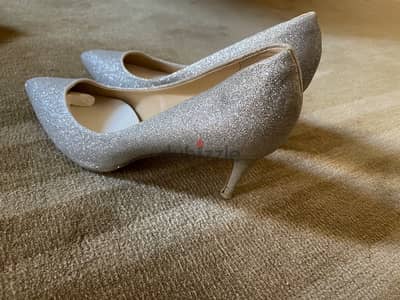 Charles and Keith silver heels